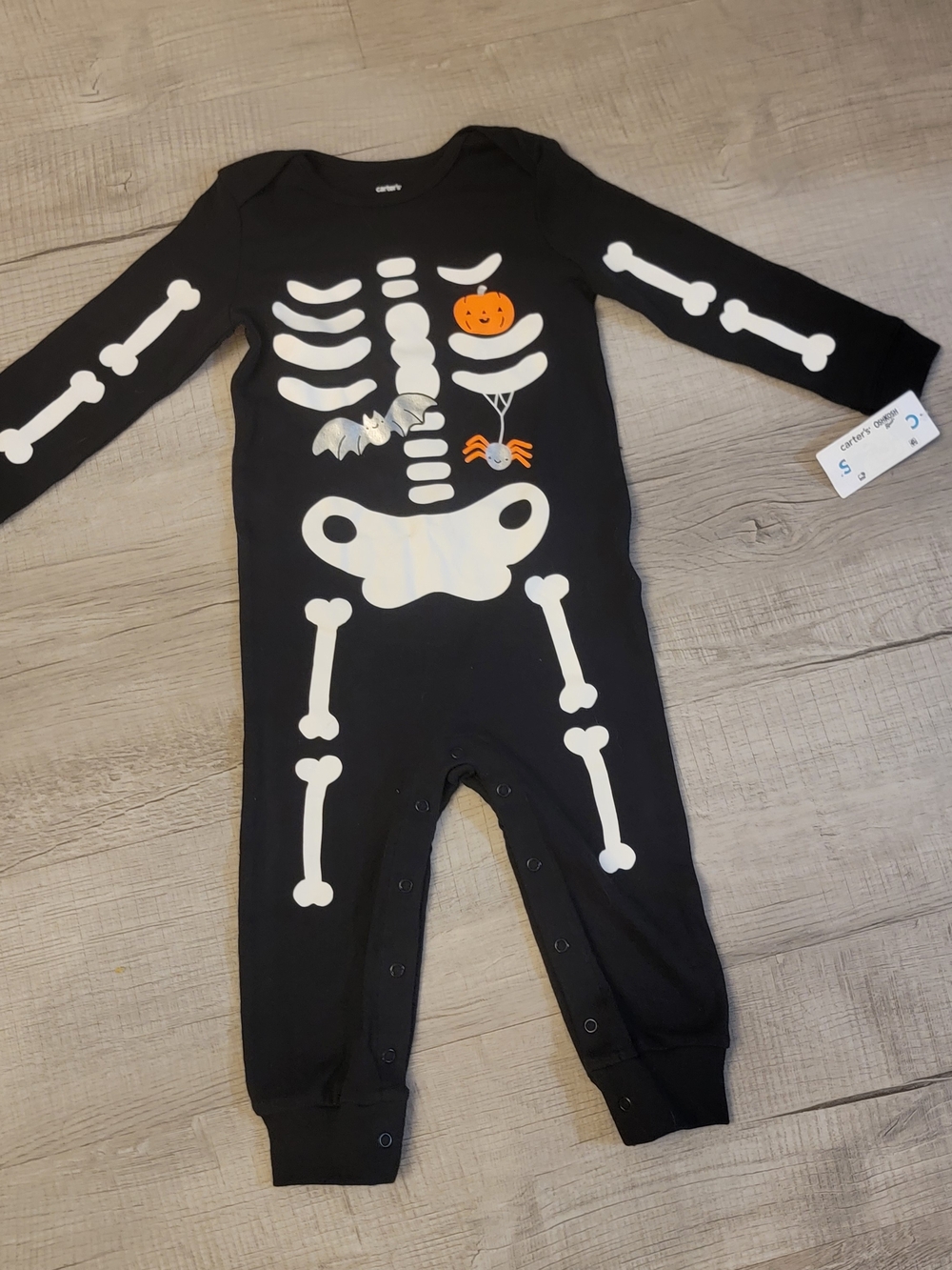 Carter's Black Skeleton Graphic One-Piece Pajamas with Orange & White Accents
